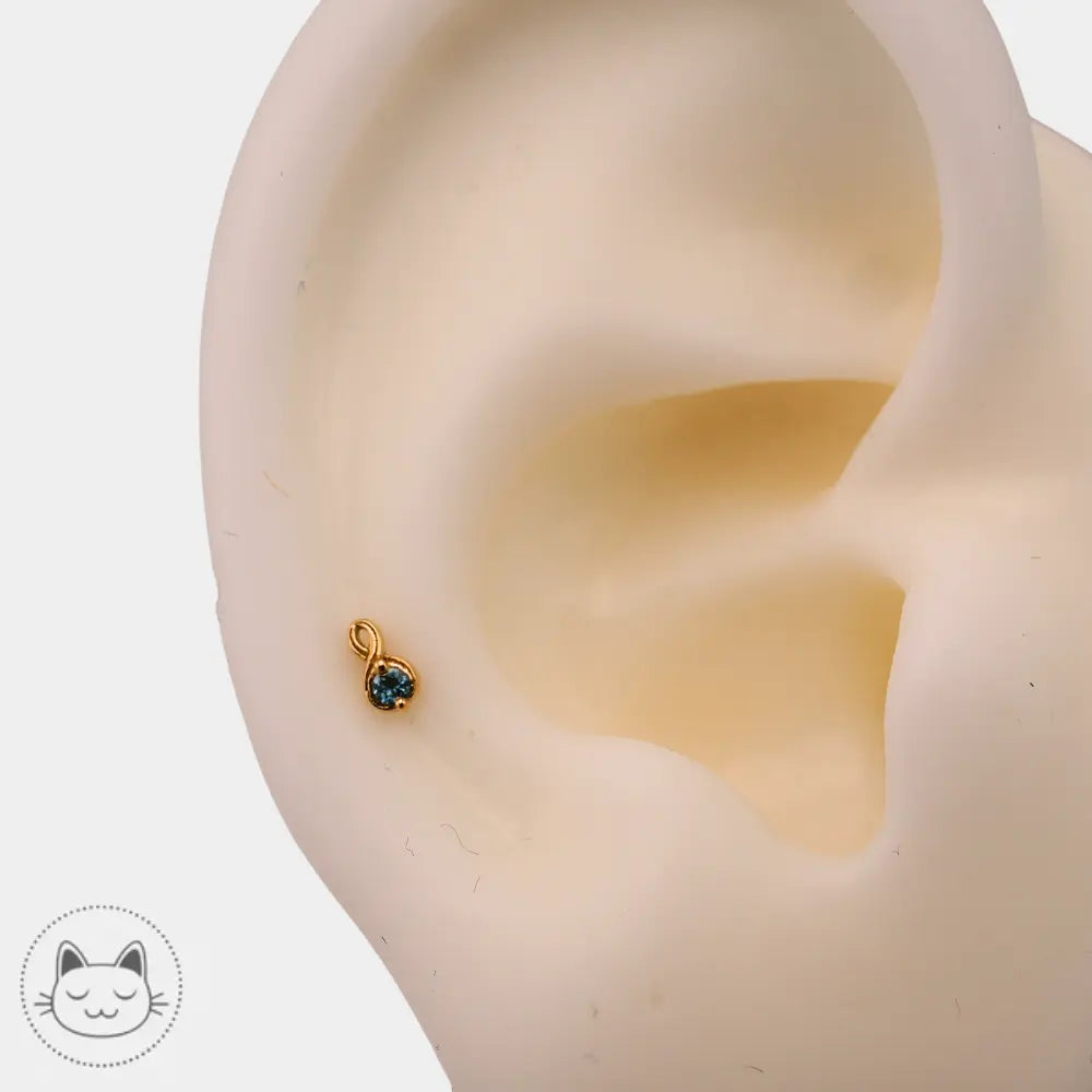 Bijou de piercing Naga Celestia en or 14 carats serti de saphir bleu