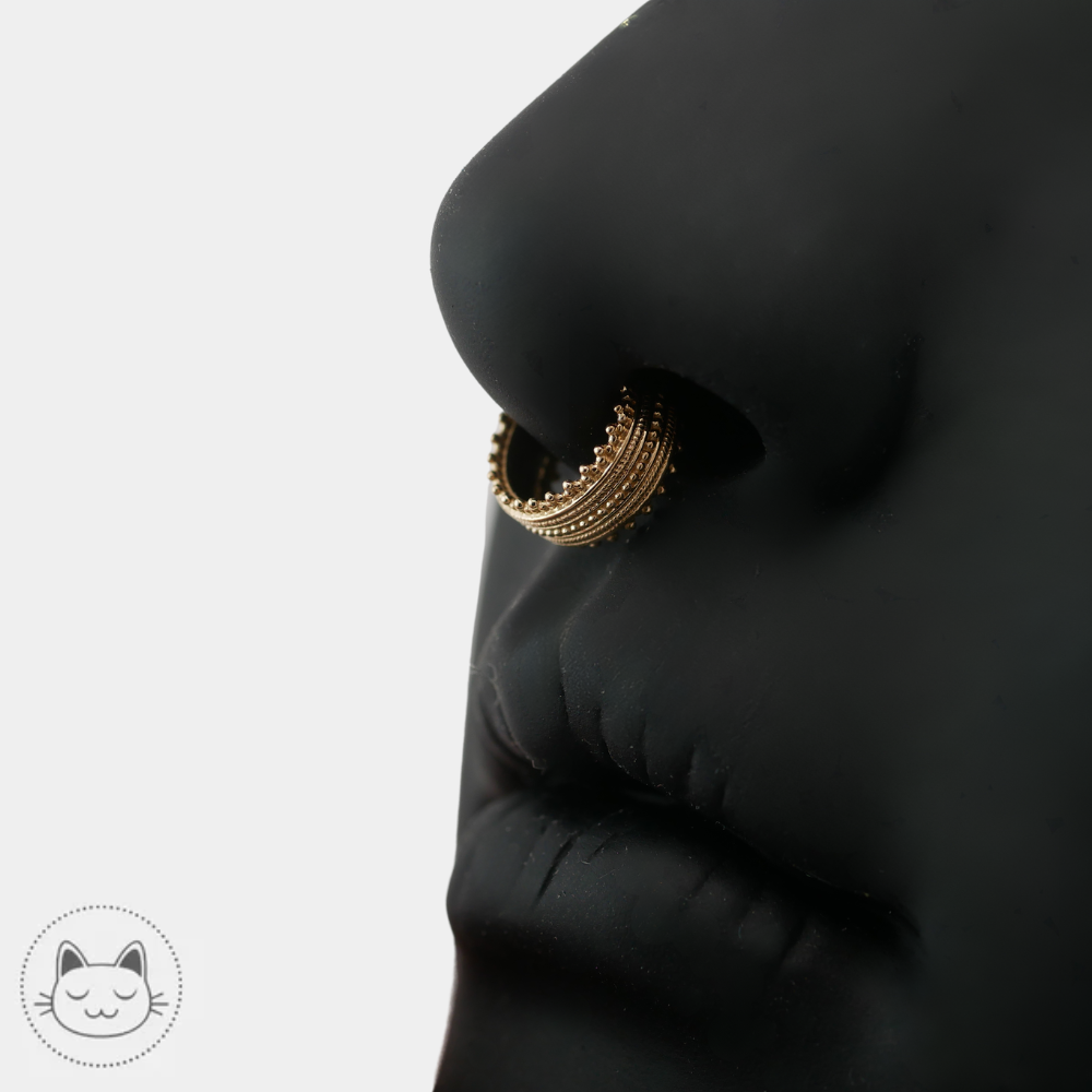Anneau clicker or jaune Naga Balmoran pour septum et hélix