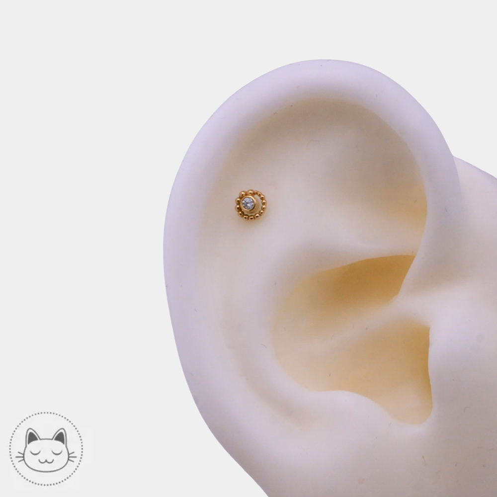 Piercing BVLA modèle Tiny Beaded Swirl or jaune diamant blanc