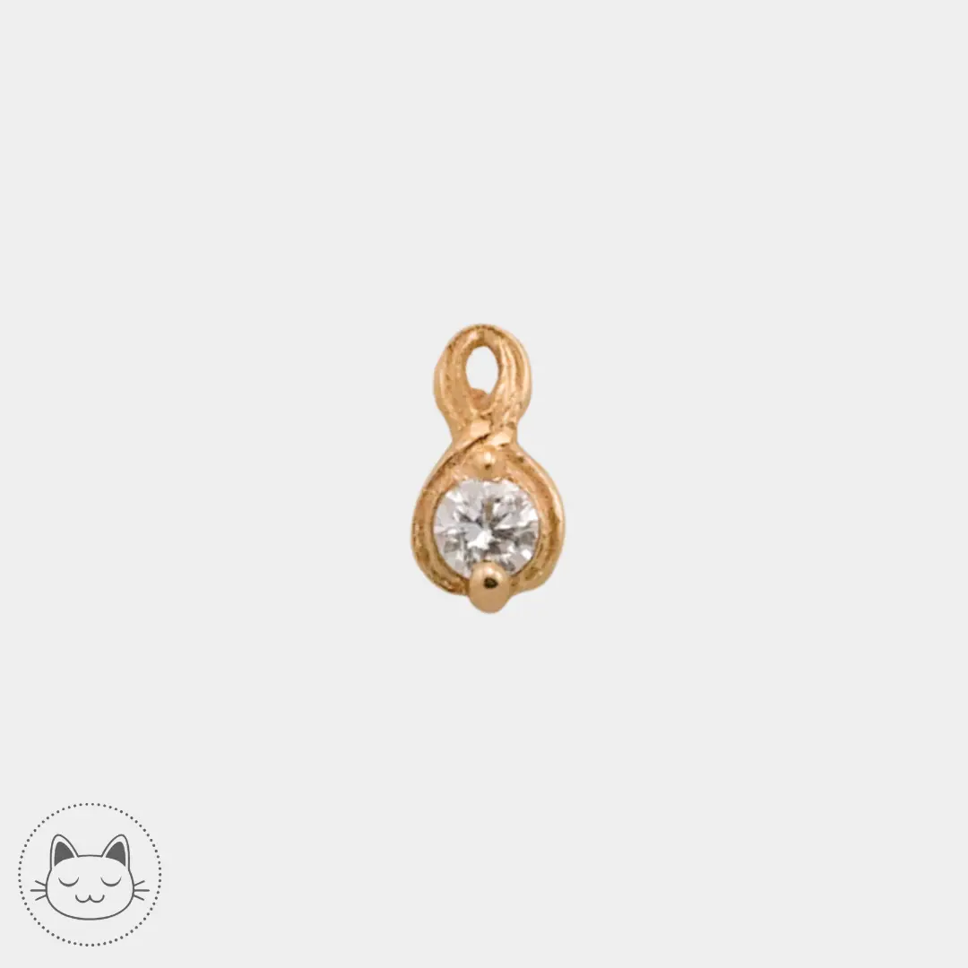 Naga Jewelry - Celestia - Or jaune et diamant blanc

Cabochon threadless en or 14 carats et diamant blanc, 4,5 mm.